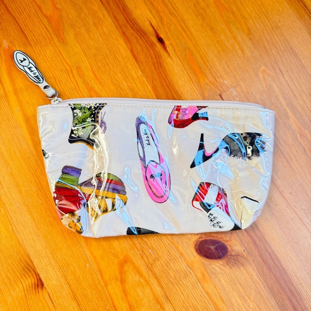 Nick & Nora vintage makeup pouch with shoe/boot print